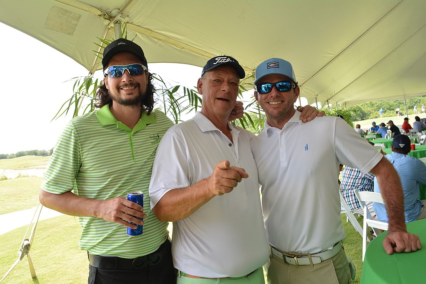 Brandon James, Sen. Robert Buschman and Carl Eskew