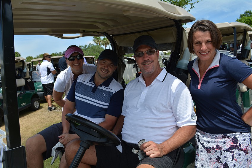 Sharon Smoley, Matt Sacco, Andy Madtes and Tracie Hamersley are all smiles.