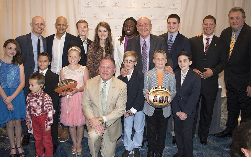 Dick Vitale poses with his two honorees and several pediatric cancer patients and survivors at the Dick Vitale Gala on May 12 at The Ritz-Carlton, Sarasota.