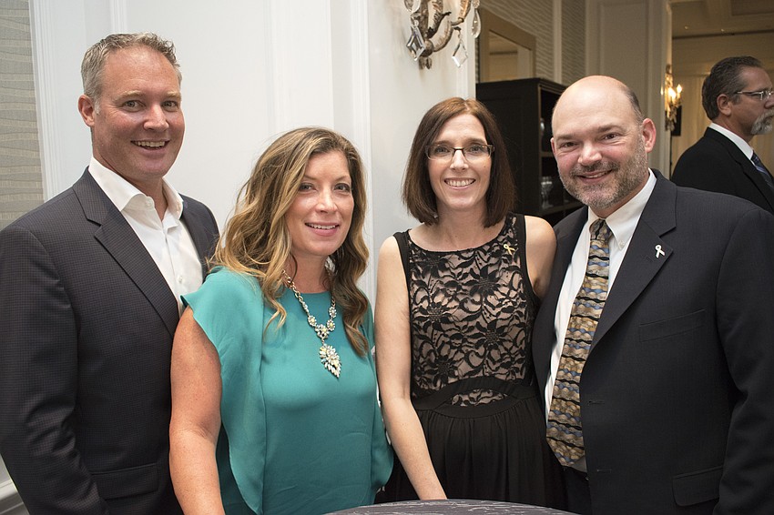 Mike and Emma Stringer with Jennifer and Brian Peddie