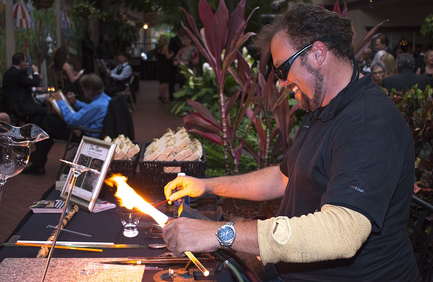 Dave Walker does a glass blowing demonstration during cocktail hour at Golden Hearts: A Celebration of Philanthropy on May 13 at Michael’s On East.