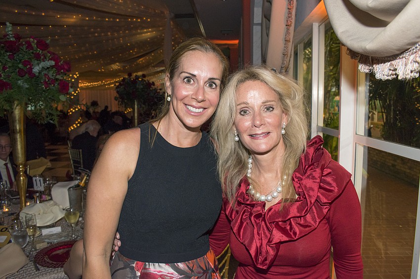 Terri Vitale, who accepted the Golden Heart Award for her father Dick Vitale, with Co-Chairwoman Kim Githler
