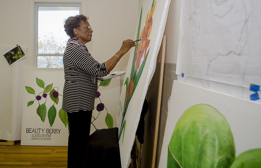 Norma Albertha Winter works on one of the 11 paintings she is creating for Historic Spanish Point.