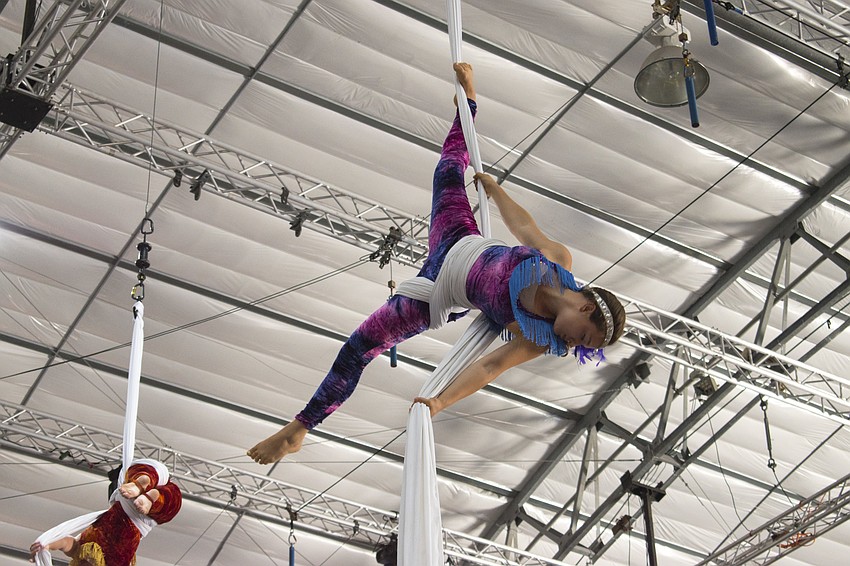 Sailor Circus students perform an aerial silks routine at La Cirque Appetit on May 16 at Sailor Circus Arena.