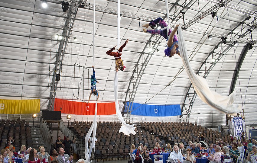 Sailor Circus students perform an aerial silks routine at La Cirque Appetit on May 16 at Sailor Circus Arena.
