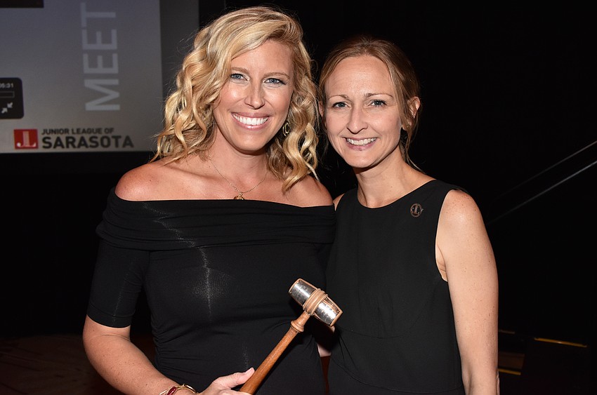 Outgoing Junior League of Sarasota President Britt Riner and incoming Junior League of Sarasota President Erin Duggan
