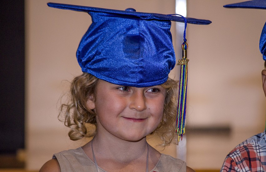 Sonja Cardell smiles during the graduation ceremony at St. Boniface Preschool.