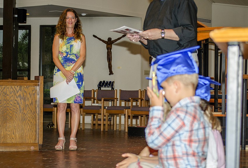 St. Boniface Preschool Director Sarah Schebel smiles during the graduation ceremony at St. Boniface Preschool.