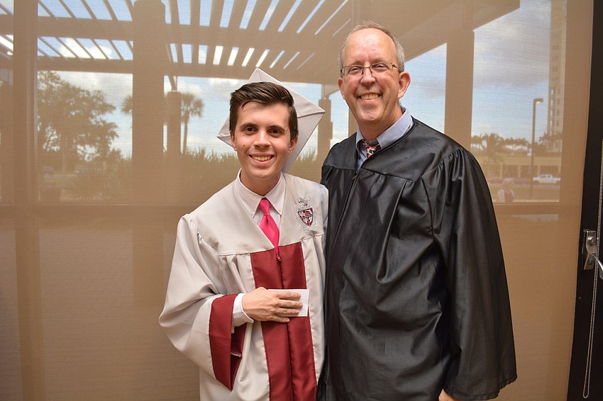Braden River'     s Brian Long, graduating in the Top 10%, poses with his dad and Braden River teacher Steven Long.