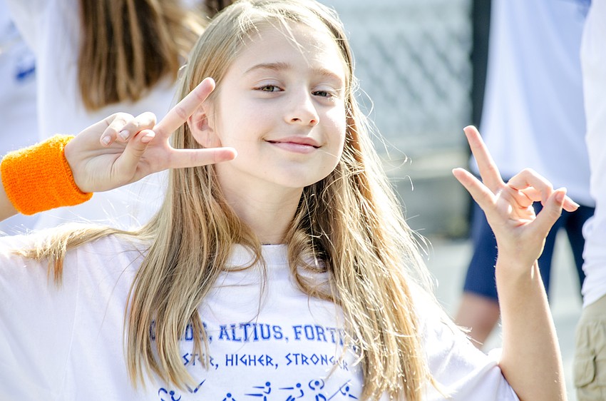Charlie Anne Gullick strikes a pose during one of the opening ceremony activities.