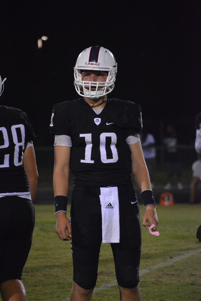 Bryan Gagg waits for a signal from offensive coordinator Eric Sanders.