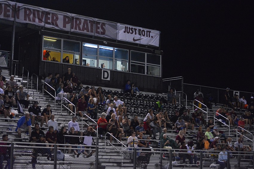 The crowd stuck with the Pirates through the steady rain.
