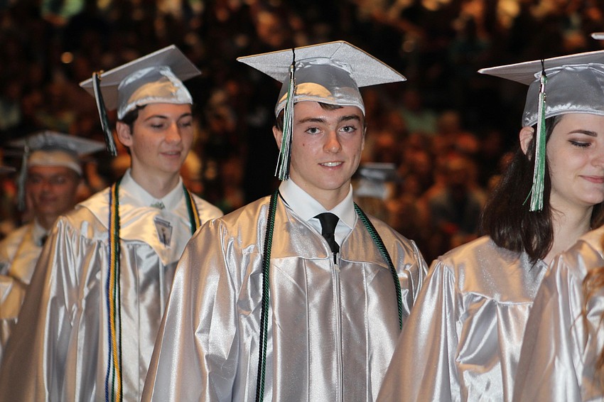 Lakewood Ranch High School graduate Ian Griffin takes his seat before the start of the graduation ceremony.