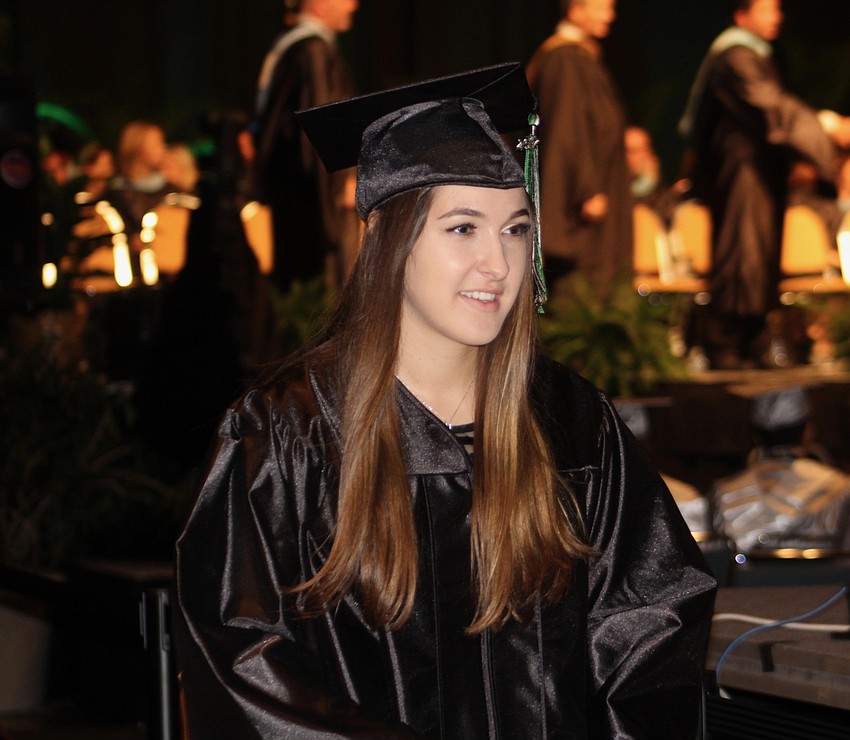 Lakewood Ranch High School graduate Jordyn Sacks walks back to her seat after receiving her high school diploma.