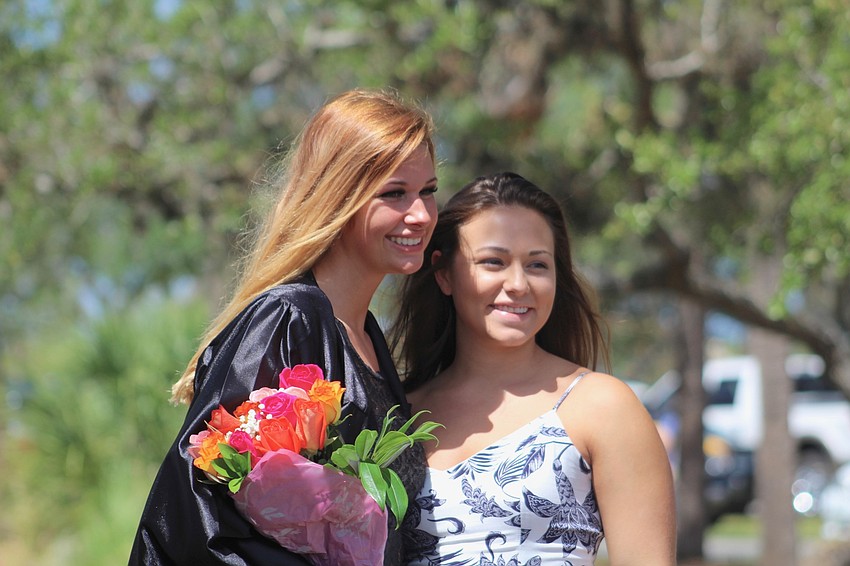 Lakewood Ranch High School graduate Sierra Ellis enjoys the ceremony with her friend best friend Jill Wells.