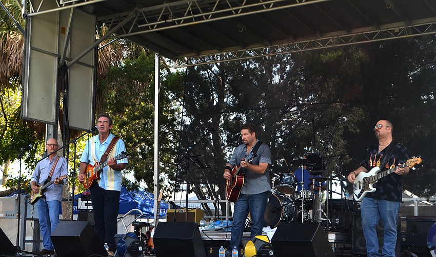 Kettle of Fish performs for the Saturday evening crowd.