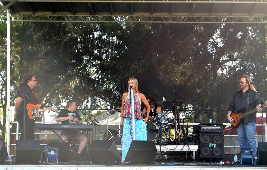 Twinkle and Rock Soul Radio took the stage following Kettle of Fish. The band sang “Happy Birthday” to festival director Bill Kinney.