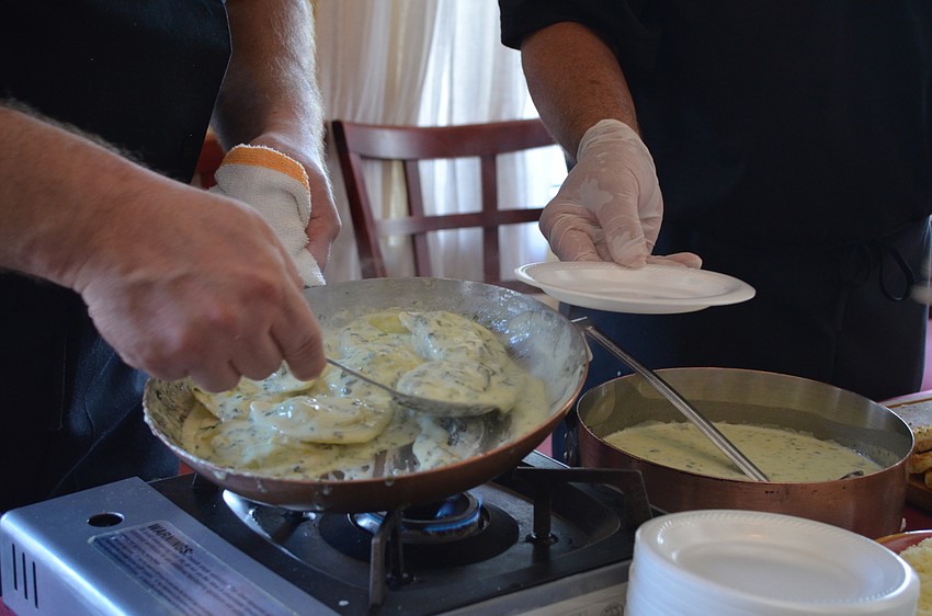 Saluté served agnolotti pasta.