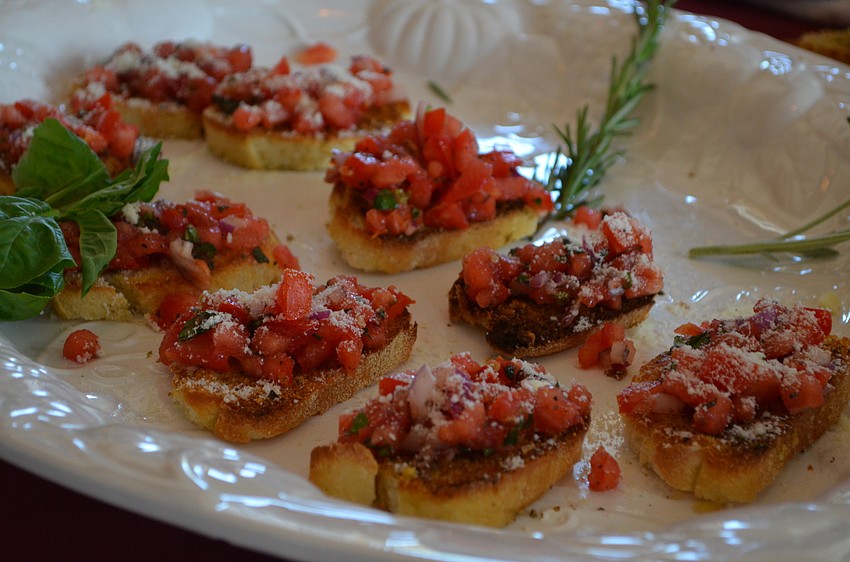 Saluté served tomato bruschetta.