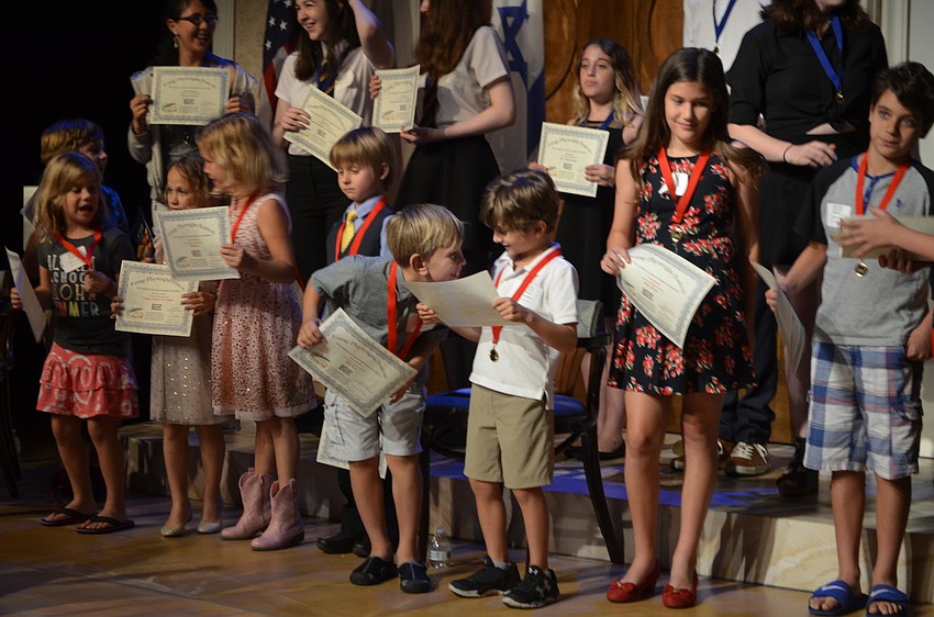 Winning playwrights pose for photos.