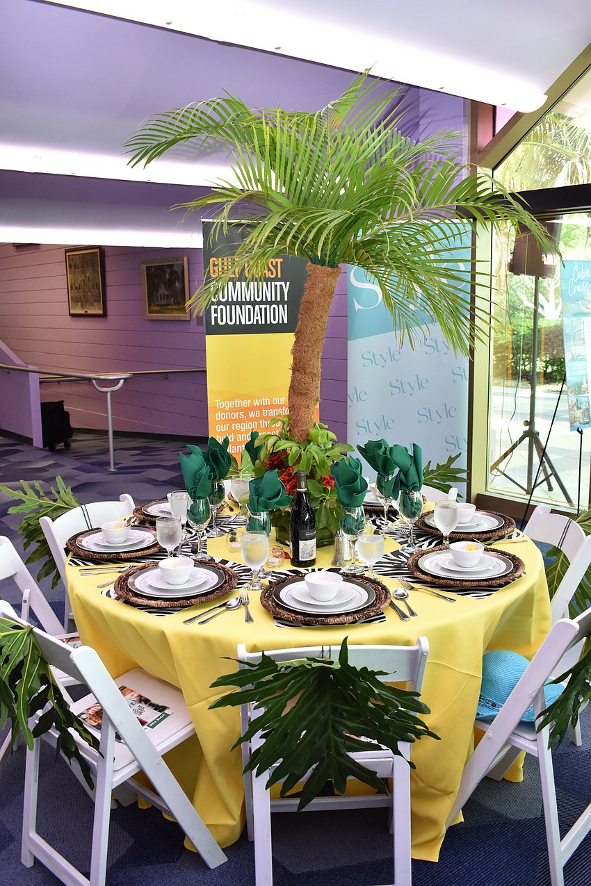 Table 1 guests welcomed diners to the jungle with their wild decor for their table at Men Who Cook & Brew on May 21 at Mattison’s Bayside at Van Wezel Performing Arts Hall.