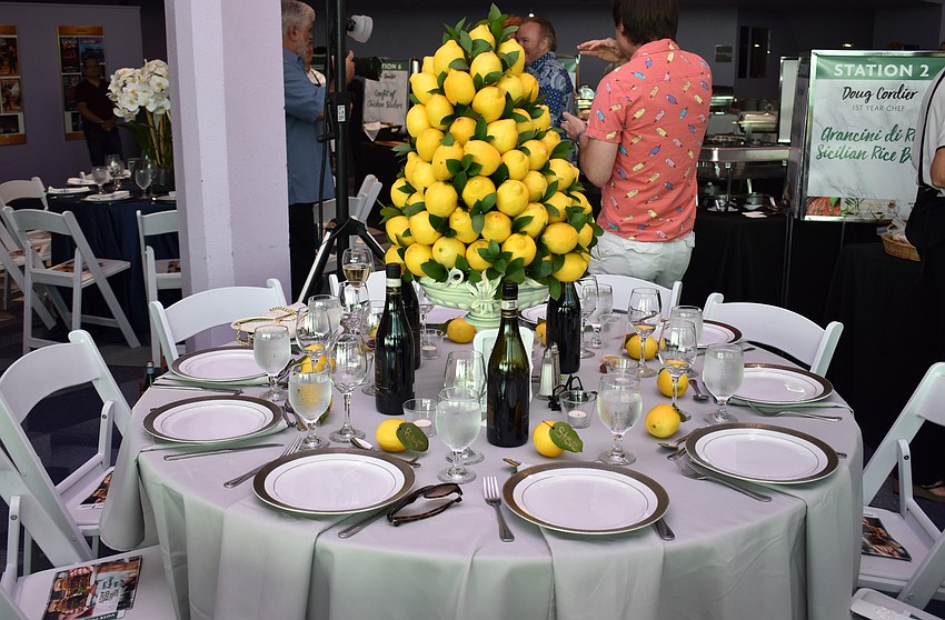 Table 9 guests chose a citrus theme for their lemon-adorned table at Men Who Cook & Brew on May 21 at Mattison’s Bayside at Van Wezel Performing Arts Hall.