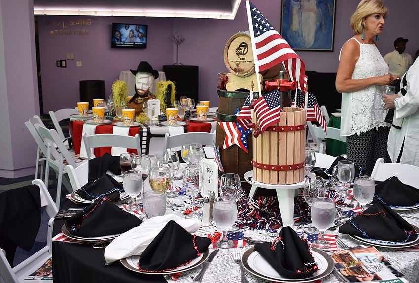 Table 8 guests got very patriotic with the decor they chose for their Freedom of the Press-themed table at Men Who Cook & Brew on May 21 at Mattison’s Bayside at Van Wezel Performing Arts Hall.