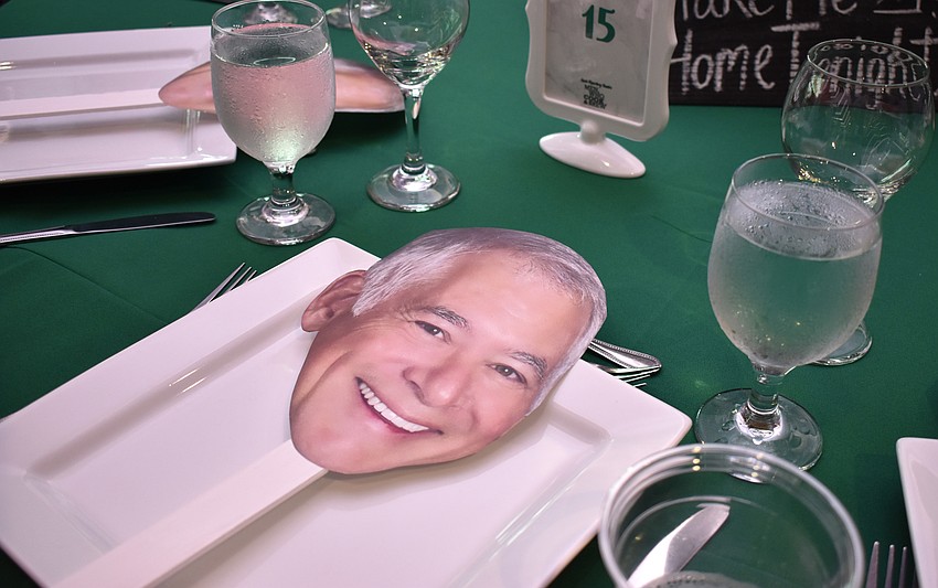 Chef Peter Amster’s supporters made signs with his face on them for Men Who Cook & Brew on May 21 at Mattison’s Bayside at Van Wezel Performing Arts Hall.