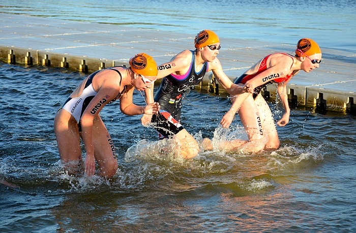 Heidi Stimac, Laurin Thorne and Holly Henry compete in the 2015 Sarasota-Bradenton Triathlon at Nathan Benderson park.