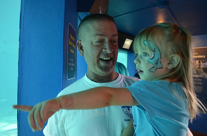 Charlotte and Jim  Winemiller are all smiles at last year&#39;     s World Oceans Day Celebration.