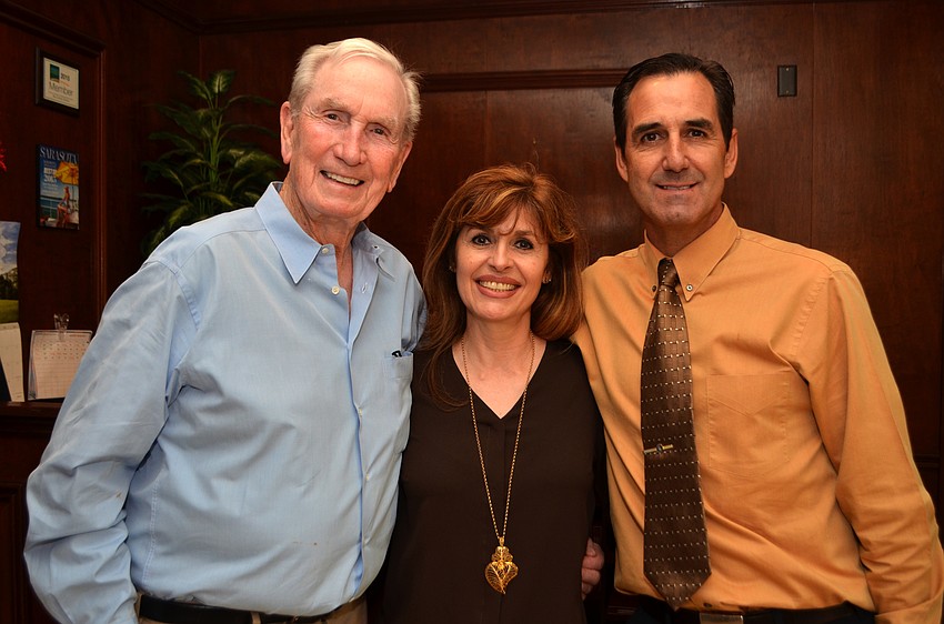 Amore owner Howard Rooks, hostess Liana Vitorino and manager Tito Vitorino