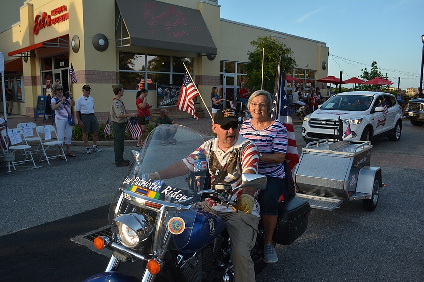 Ellenton'   s Terry and Sue Longpre rode one of the many motorcycles in the parade.