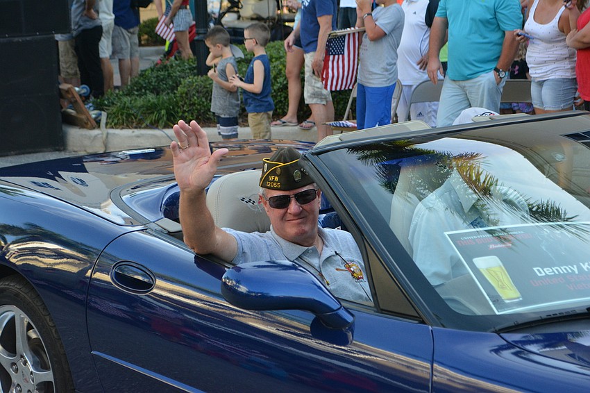 Vietnam veteran Denny King acknowledges the crowd.