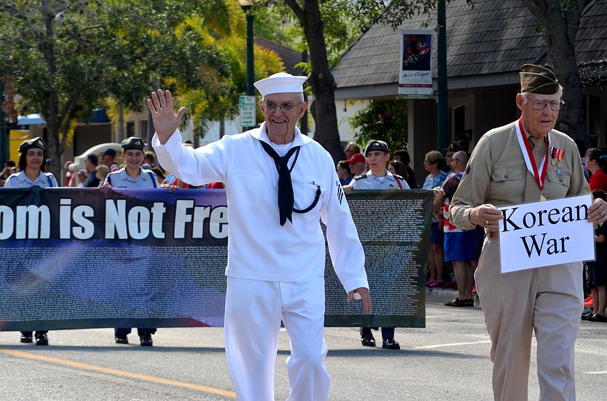 Korean War Veterans march down Main Street during the parade.