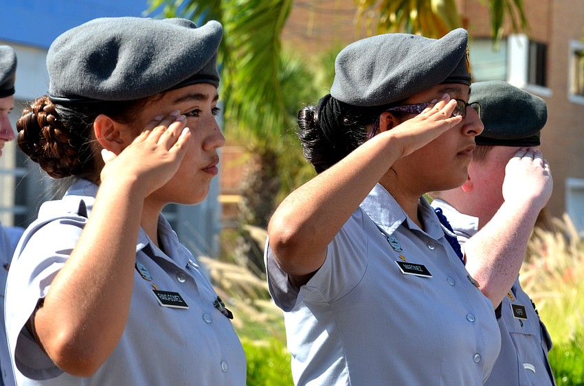 Sarasota Military Academy cadets salute during “Taps.”