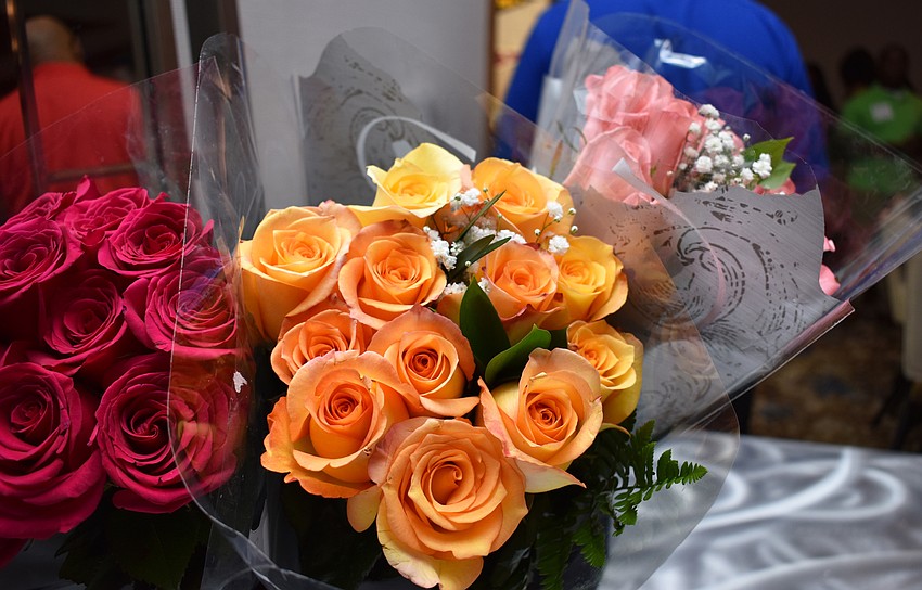 Roses sat on the table before being handed to honorees during the Celebration of Hope on May 31 at The Francis.