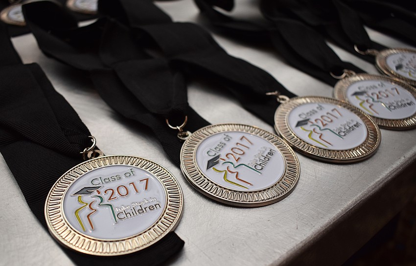 Medals were laid out on a table next to the stage before being handed out to graduates during the Celebration of Hope on May 31 at The Francis.