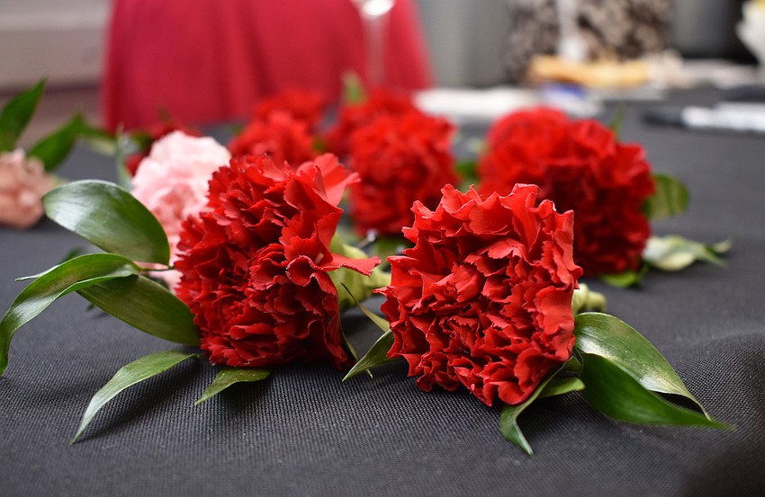 All the students who received scholarships were given a boutonniere to wear at the Woman'   s Exchange Awards Celebration on June 1 at Woman’s Exchange.