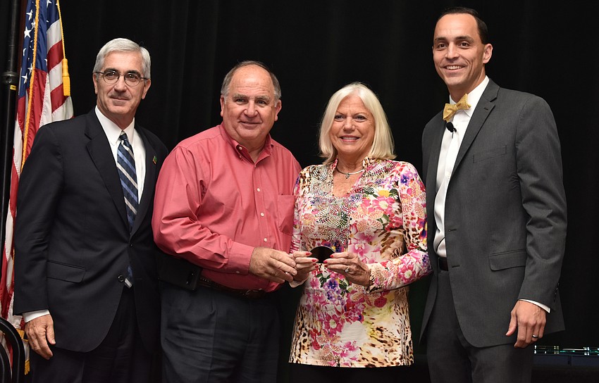 Rick Piccolo, Janet and Dean Mixon, owners of Hospitality and Tourism Organization of the Year Mixon Fruit Farms, and Greater Sarasota Chamber of Commerce President and CEO Kevin Cooper