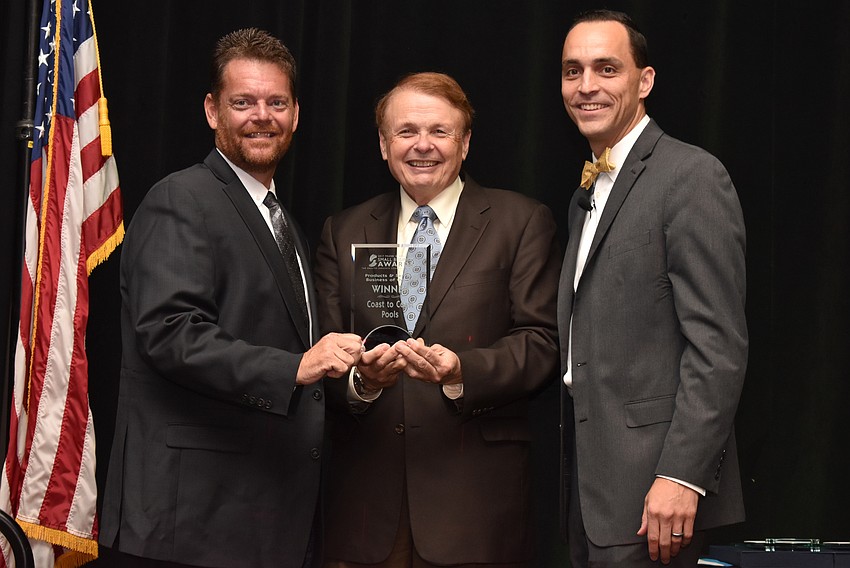 Larry Thompson, Dustin Pointer, owner of Products & Services Business of the Year Coast to Coast Pools, and Greater Sarasota Chamber of Commerce President and CEO Kevin Cooper