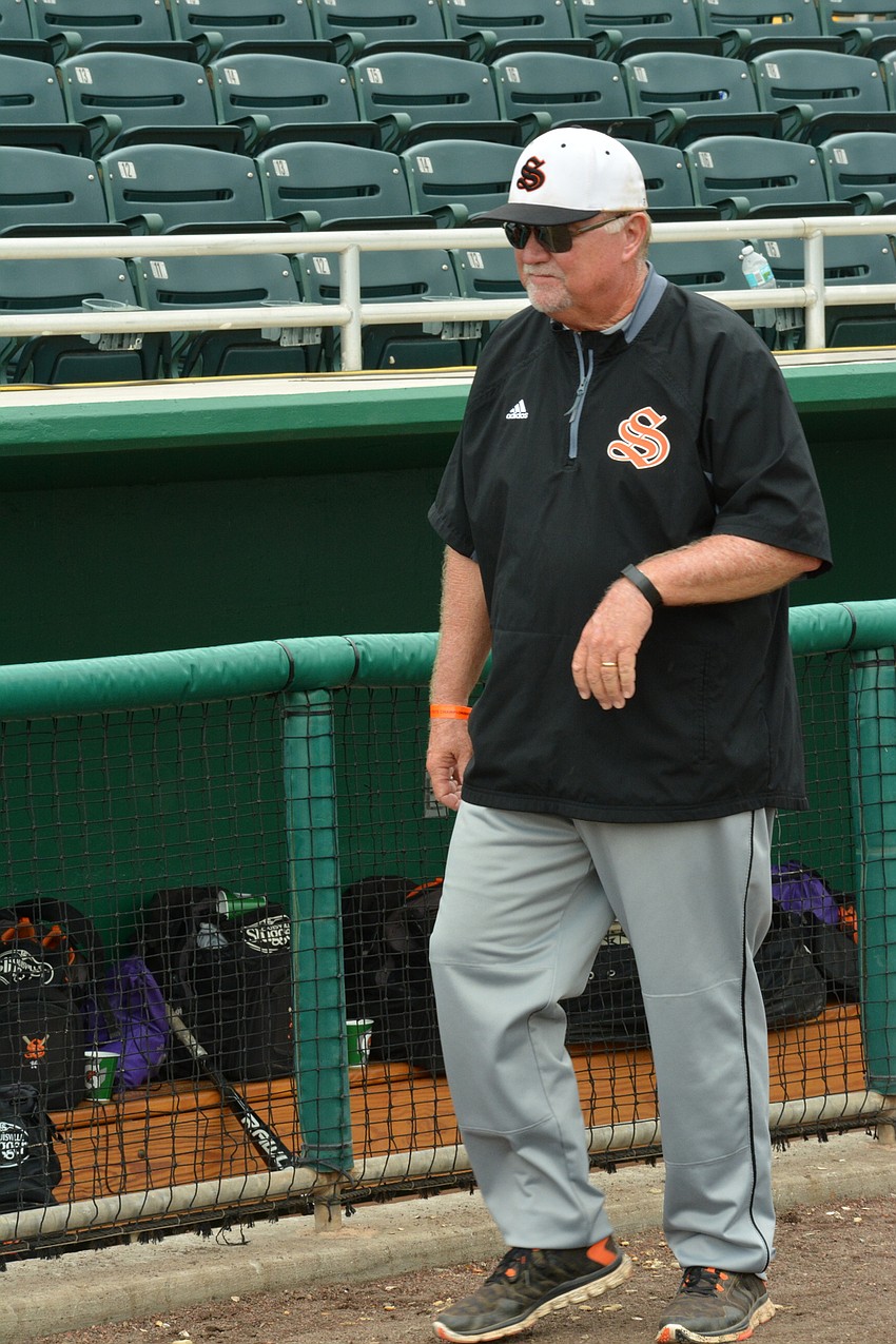 Clyde Metcalf watches the Sailors pregame.