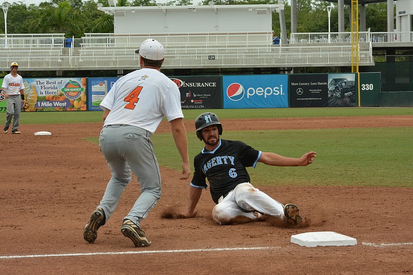 Third baseman Josh Paige (4) readies for a throw from the outfield.