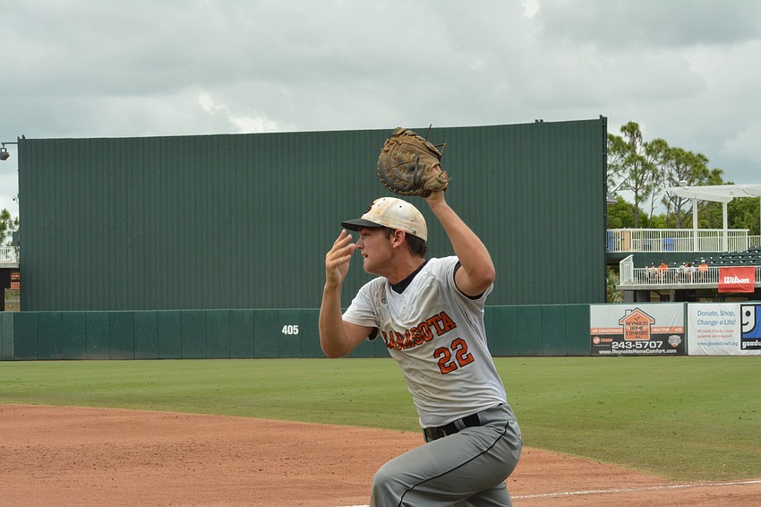 Brooks Larson looks toward the infield after catching a popup.