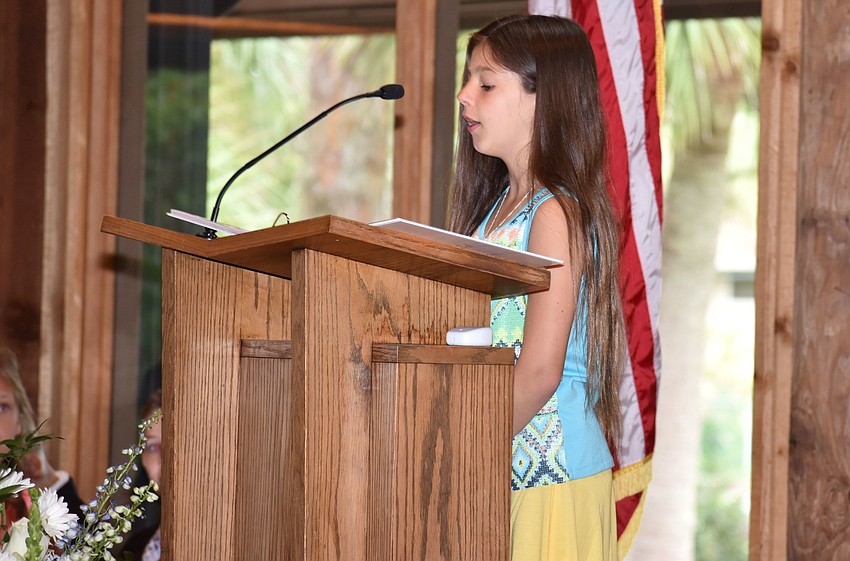 Giulia Lyons gives a speech at the Out-of-Door Academy Lower School Graduation on June 2 at Siesta Key Chapel.