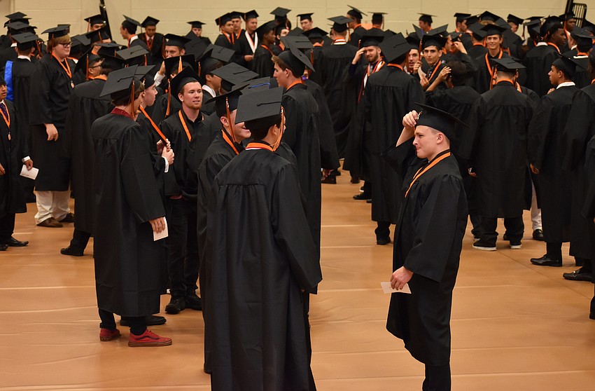 Students waited for the signal to line up in the gymnasium before graduation began on June 2 at Sarasota High School.