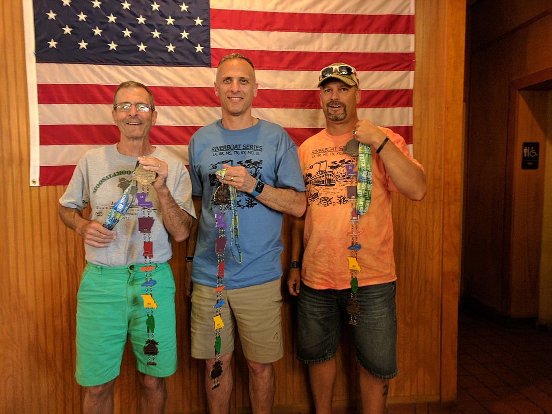 John Izzo, Monroe, Wash.&#39;  s Eric Ciocco and Bradenton&#39;  s Ted Watson with their medals for completing the Riverboat series. Courtesy photo.