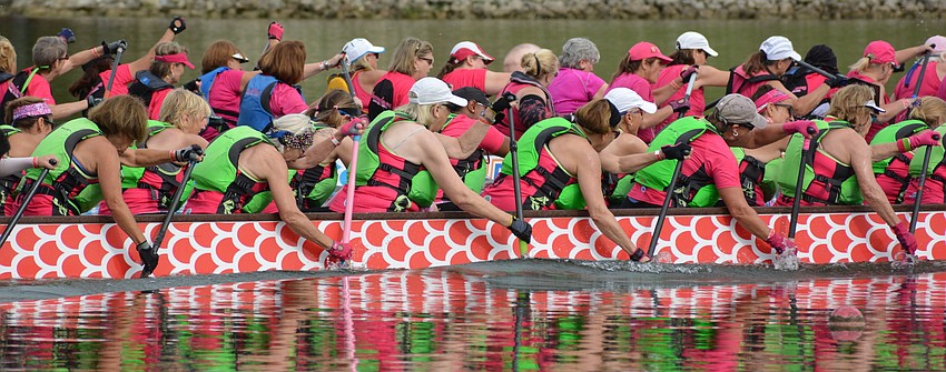 It'        s a mad dash to the end of a heat race for Survivors in Sync (front).