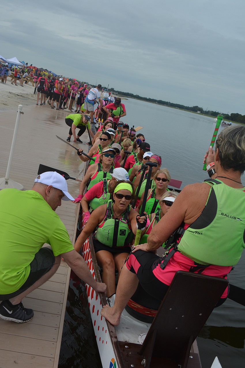 Survivors in Sync loads up for a race as do other competitors.