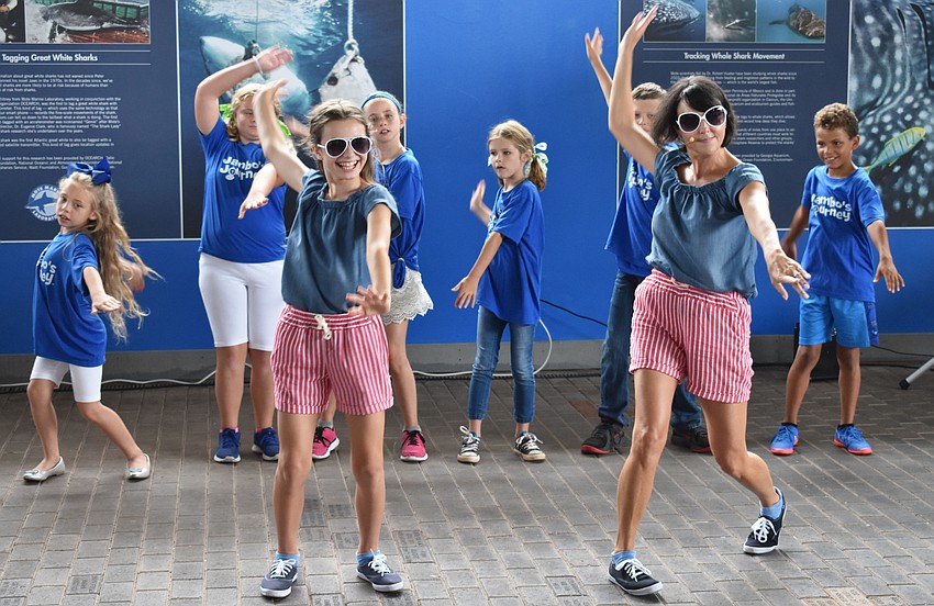 Team Jambo performs an ocean-themed dance and song routine at World Oceans Day on June 3 at Mote Aquarium.