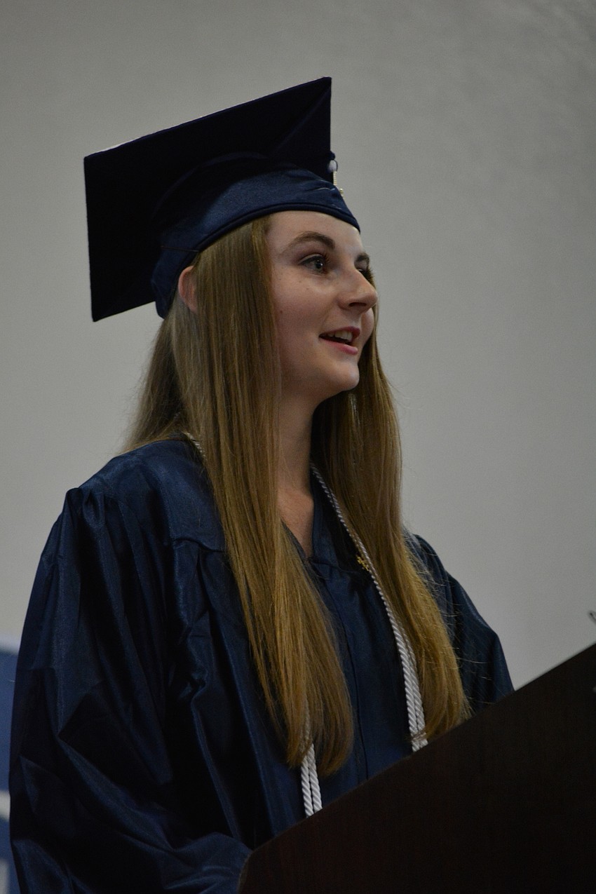 Valedictorian Caitlin Camire makes her speech a mix of academic prowess and wisdom gained from teachers and friends.